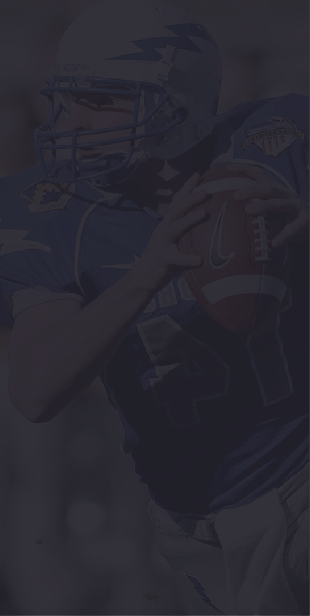 Picture of American football player about to throw the football